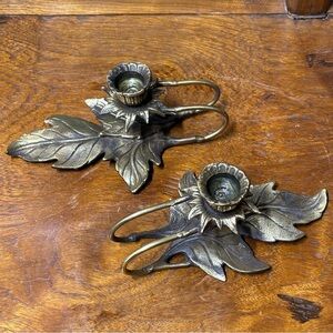 Set of two intricate leaf brass candlestick holders